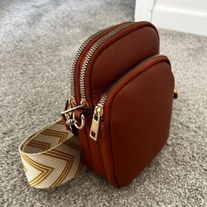 Small brown leather crossbody bag